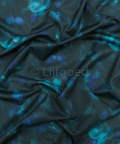 lycra donkerblauw 148cm turquiose bloemen vervaagd